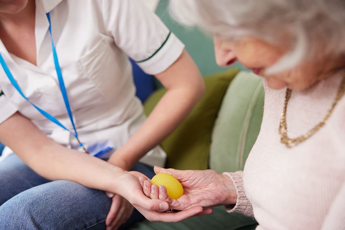 occupational-therapy-prairie-health-group-female-senior-squeezing-ball