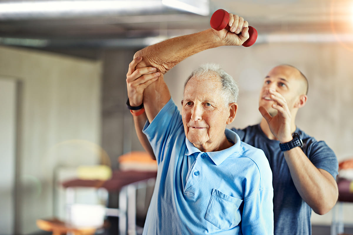physical-therapy-prairie-health-group-male-senior-lifting-hand-weight